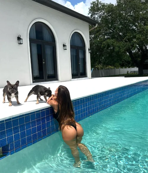 Celina playing with her dog 